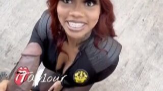 Coop Princess Tay checking out a black man’s car