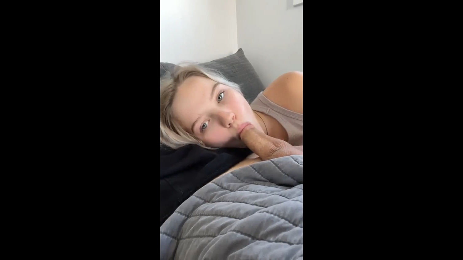 cutie sucks dick while cuddling on couch